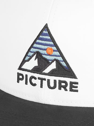 Picture Organicin musta-valkoinen Kuldo Trucker -lippis logo kuvattuna