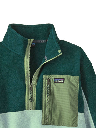 Patagonian lasten Microdini 1/2 Zip Fleecepusero Virtually Blue -sävyssä lähikuvassa vetoketjua ja tasku 