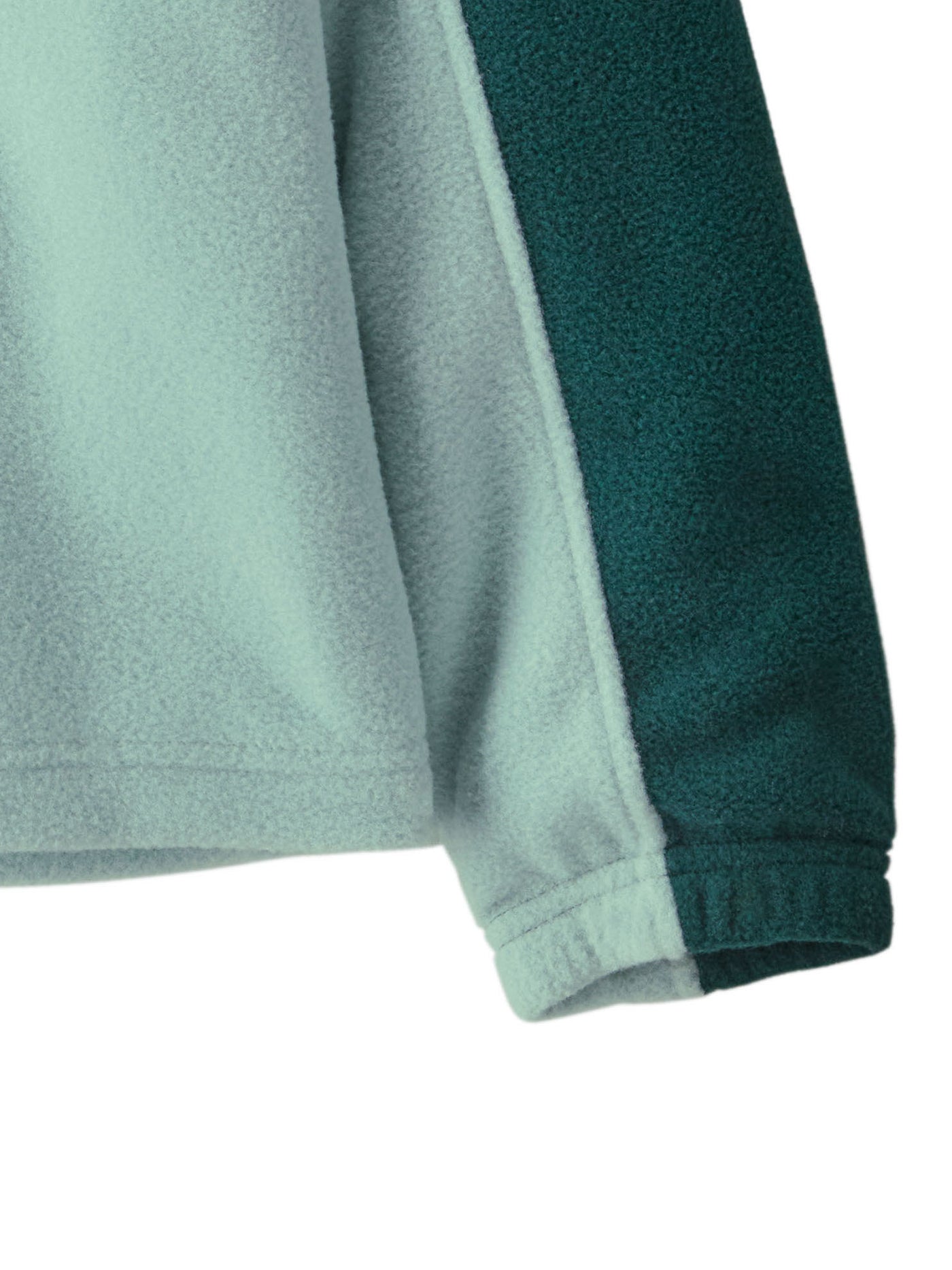 Patagonian lasten Microdini 1/2 Zip Fleecepusero Virtually Blue -sävyssä lähikuvassa helma ja hihansuu