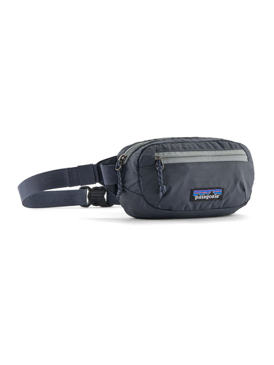 Patagonia Terravia minivyölaukku Smolder Blue. Kiinnityshihna näkyy sivulla.