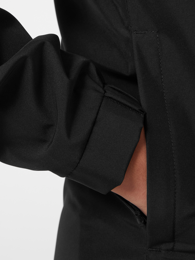 Helly Hansen Junior Active 2.0 takki värissä Black lähikuva hihansuusta ja taskusta