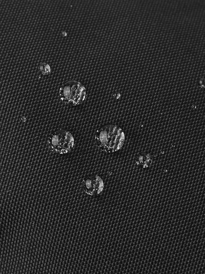Reima Askare lasten mustat välikausirukkaset - vedenpitävyys kuvattuna pisaroilla