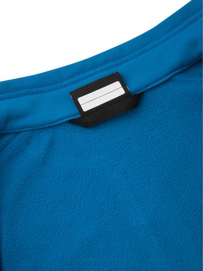 Reiman Jauhatus pusero pehmeän sinisen sävyssä lähikuvassa sisämateriaali