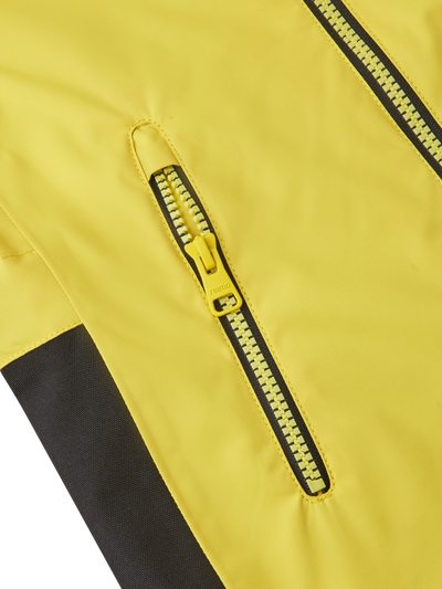 Reiman Kapelli Reimatec välikausihaalari keltaisessa värissä lähikuvassa vetoketjut