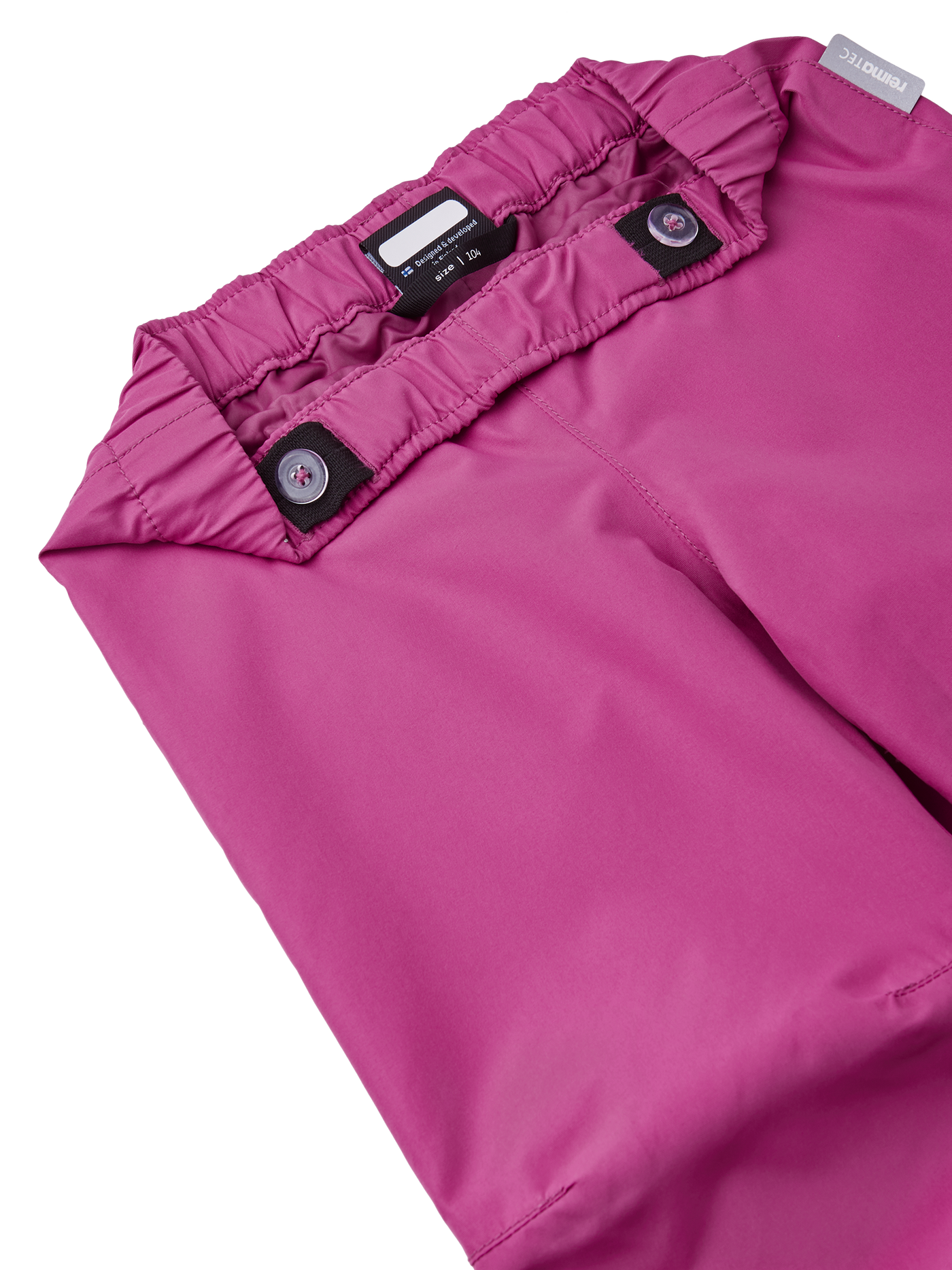 Reimatec Kaura välikausihousut Magenta Purple sävyssä kuvattuna housujen vyötärönauhaa