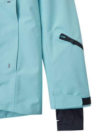 Reiman Reimatec Perille -laskettelutakki turkoosin sävyssä lähikuvassa takin hiha