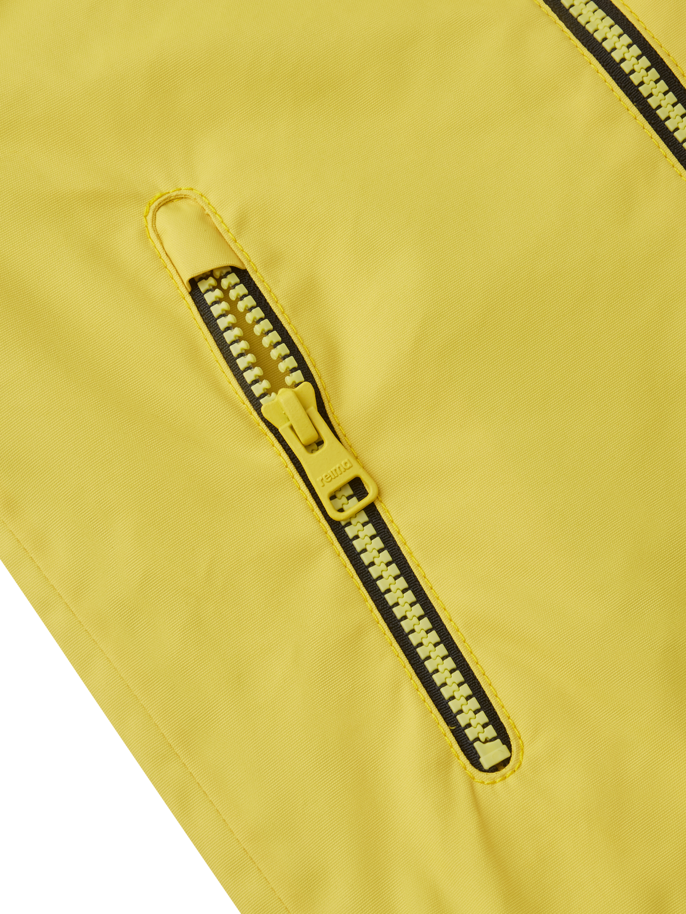 Reima Soutu lasten Reimatec takki värissä Maize Yellow lähikuva taskusta